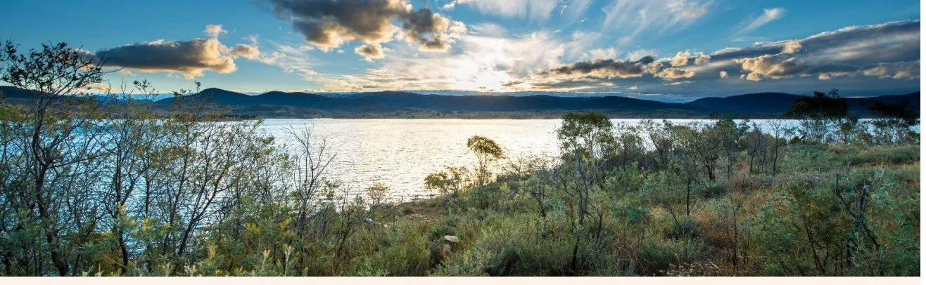 Lake Jindabyne at dusk beneath the Snowy Mountains